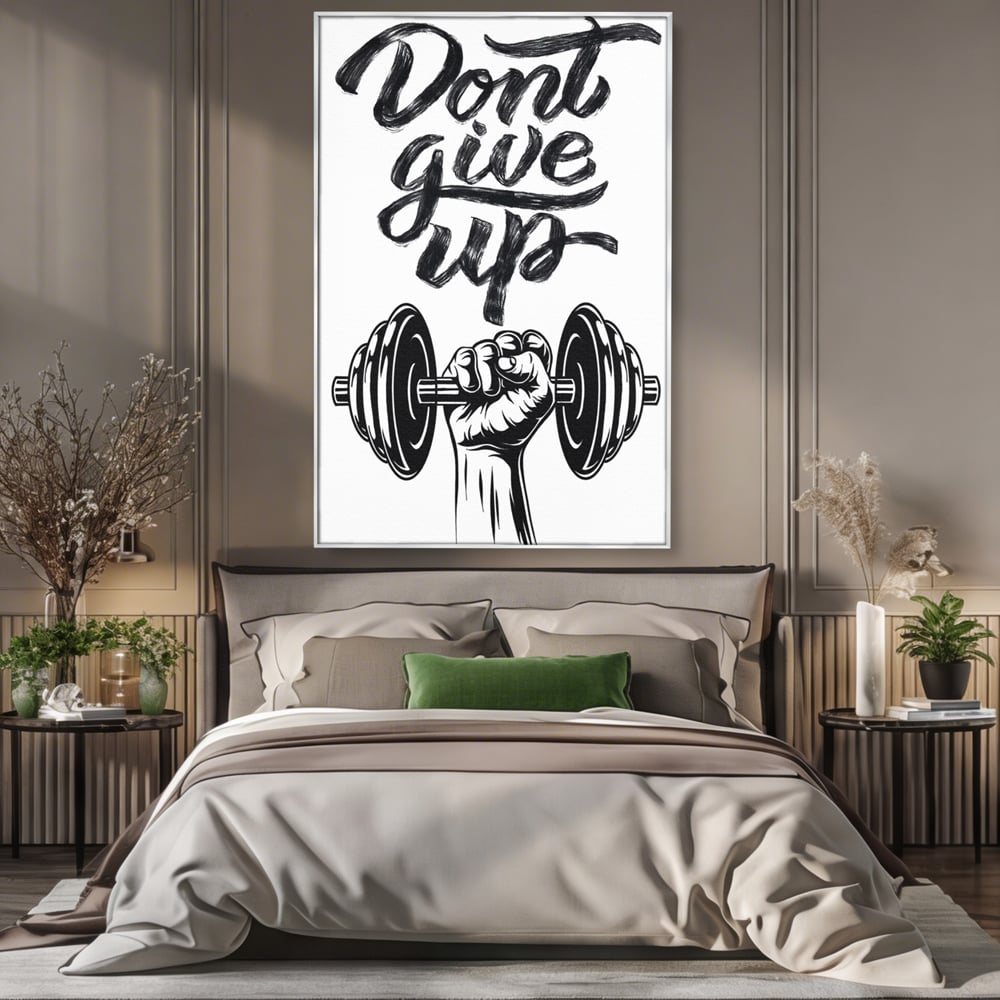 Tablou canvas cu ilustratie motivationala cu halterofil si mesaj, in rama de aluminiu argintiu, pe perete intr-un dormitor